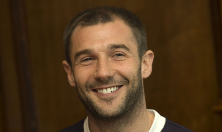 All smiles: Kevin Thomson is now a Dark Blue.