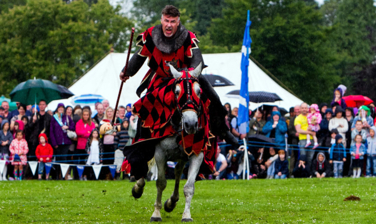 Action from the jousting event.