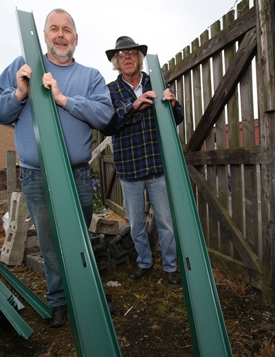 Kris Miller, Courier, 15/05/11. Picture today at Clepington Allotments, The allotments are getting a new fence!!! Harry Tosh (left) and Alexander Gauld beside the old one. See Andy Argo for story.