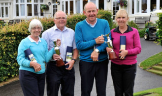 Michael and Carol Arden, senior winners of the Scottish Mixed Foursomes Golf Week, with overall winners Ian and Sandra Parr.