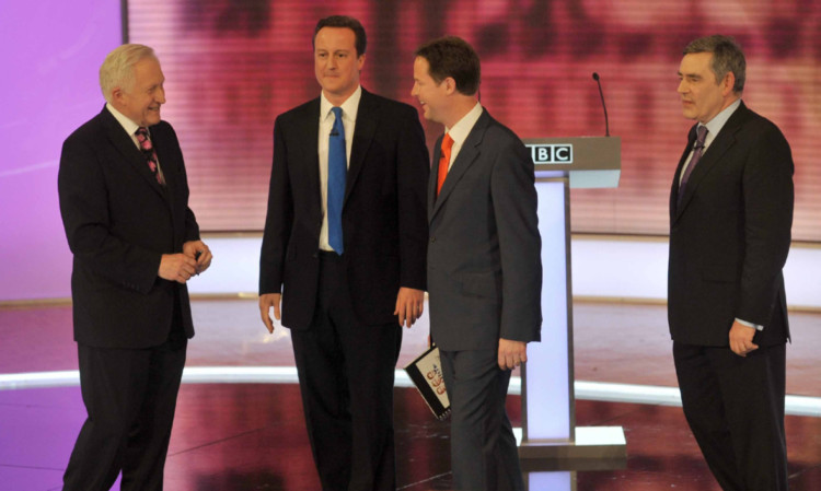 David Dimbleby, far left, with, David Cameron, Nick Clegg and and then Prime Minister Gordon Brown after the third and final televised debate in 2010.