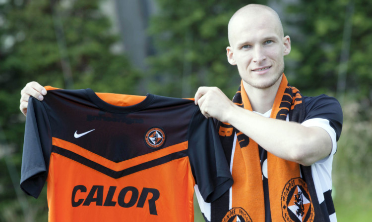 New Dundee United signing Jaroslaw Fojut at St Andrews.