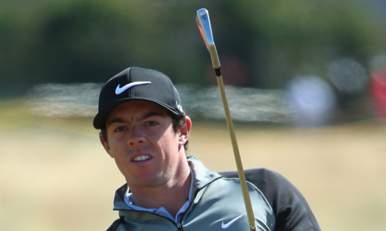 Rory McIlroy watches a shot in practice.