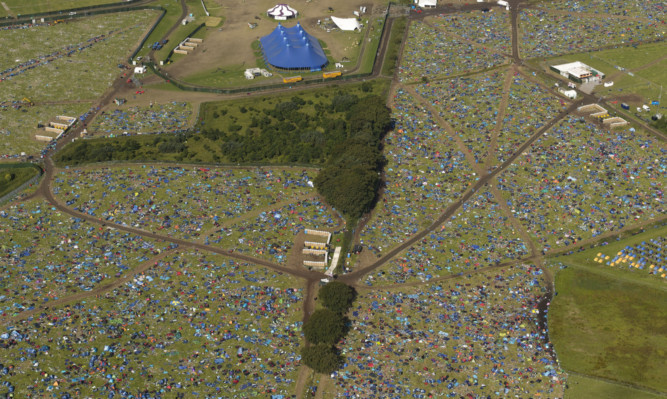 The incredible scale of the tents and rubbish left behind is shown in this photo taken on Tuesday.