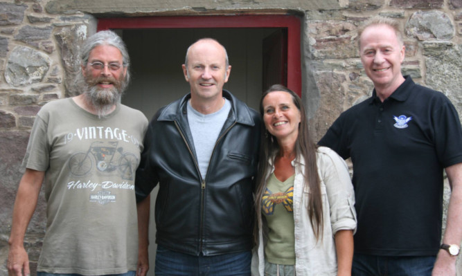 Fred MacAulay with, from left, Mike Sinclair, Maggie Sherrit and Keith Mackintosh of the Davidson Legacy.