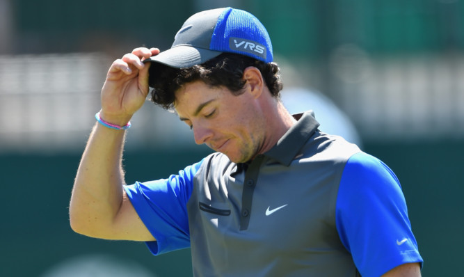 Rory McIlroy kept his head while some lost theirs on the first day of The Open.