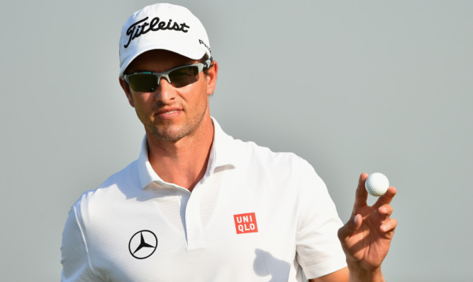 Adam Scott acknowledges the crowd during his first round.