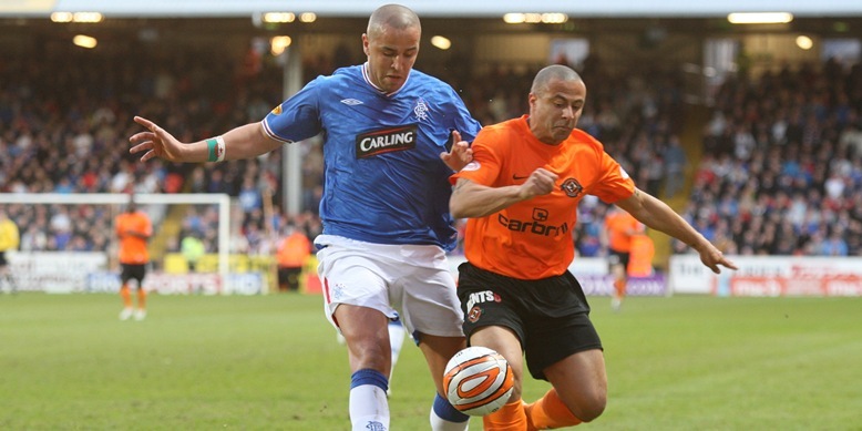 Football, Dundee United v Rangers.    United's Danny Cadamarteri and Bougherra go for the ball.