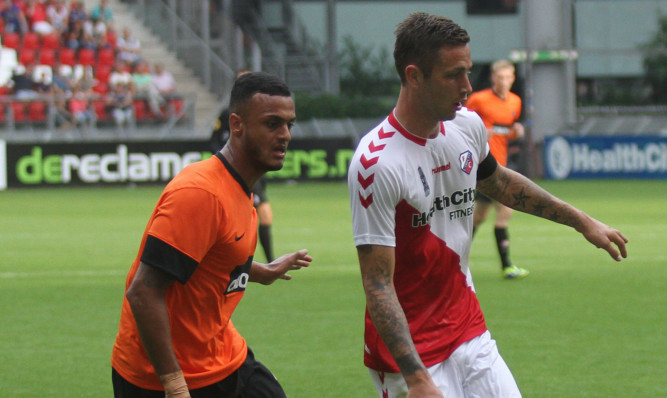 New Dundee United signing Mario Bilate challenges for the ball during the clash with FC Utrecht.