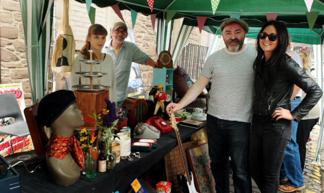 At the Johnstons Lane market, from left: Jane Gowans, Alastair Breeks Brodie of Grouchos, Richard Cook of Spex Pistols and Nicola Madill.