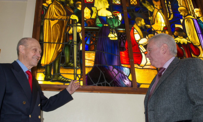 Dr John Hulbert and, right, Russell Logan in front of the stained glass window at the Masonic Lodge in Atholl Crescent.