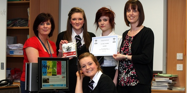 Steve MacDougall, Courier, St John's Academy, Perth. S3 pupils have won a multi-media internet competition. Pictured, at  the front is one of the pupils, Sophie Henvey, and back row, left to right is Margaret Sinclair (Support for Pupils Principal Teacher), pupil Demi Cruickshank, pupil Laura Menzies and Catriona Laing (presenting the awards on behalf of Perth & Kinross Council). The pupils were presented with a certificate and a new webcam (provided by E-Computers, Perth).
