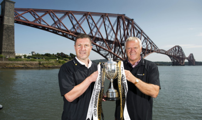 Raith boss Grant Murray joins Dunfermline manager Jim Jefferies in the shadow of the Forth Rail Bridge.