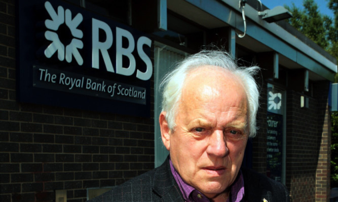 Councillor Jim Young outside the Royal Bank of Scotland in Main Street, East Wemyss.
