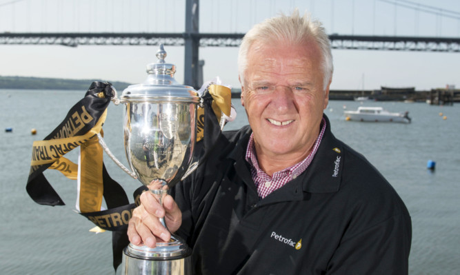 Jim Jefferies with the Petrofac Training Cup.