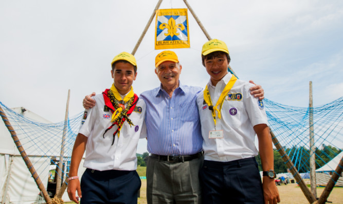 The Blair Atholl International Jamborette 2014 with three generations of same family attending. In the centre is Louis Chincotta alongside his father Javier Chincotta (right) and grandfather John Chincotta.
