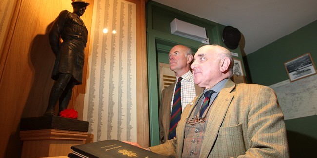 Steve MacDougall, Courier, Black Watch Museum, Balhousie Castle, Perth. Pictured, front is Major Ronnie Proctor and back is Lt. Colonel Roddy Riddell, beside a replica of the Powrie Brae Memorial and the Black Watch Roll of Honour (39-45). Picture to accompany story about reunion.