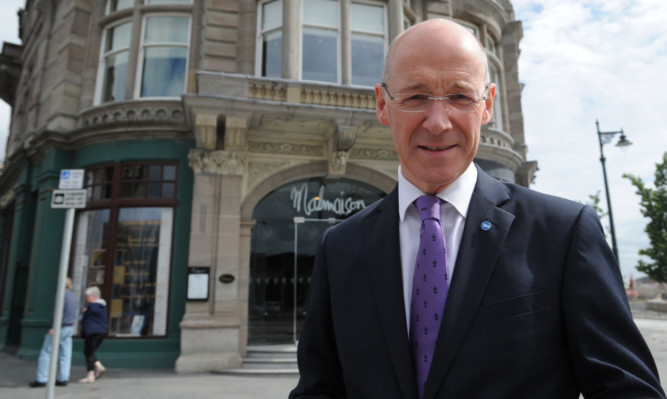 Finance Secretary John Swinney has admitted there is a case for a top rate of tax returning to 60p.