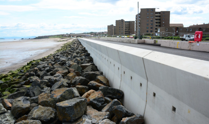 Work on the Kirkcaldy sea wall is due to be completed on time, according to contractors.