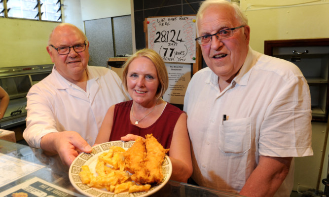 From left: owners Lawrence, Dot and Raymond Sterpaio serve up their last supper at the Deep Sea.