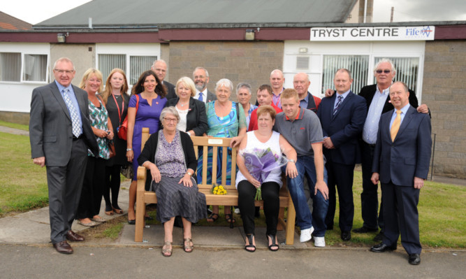The provost, MSP, councillors, friends and family of Mike Rumney at the dedication of the bench to him.