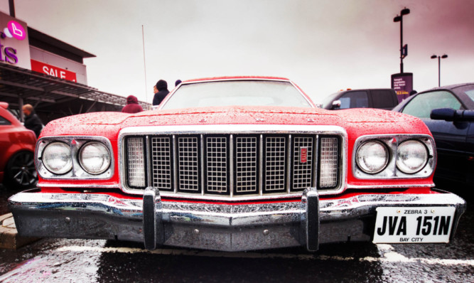 A Ford Gran Torino, the model made famous by the Starsky and Hutch TV show, was a big pull.