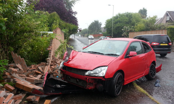 The Honda Civic suffered extensive damage in the smash which occurred on Nursery Road in Broughty Ferry.