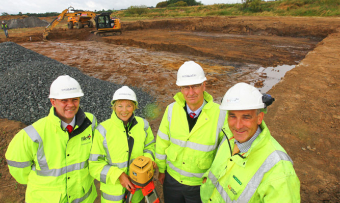 Altany Craik, Lesley, Laird, Ian Palmer, and Gary Gibson of Colorado Group mark the start of work on the new distillery site in Glenrothes.