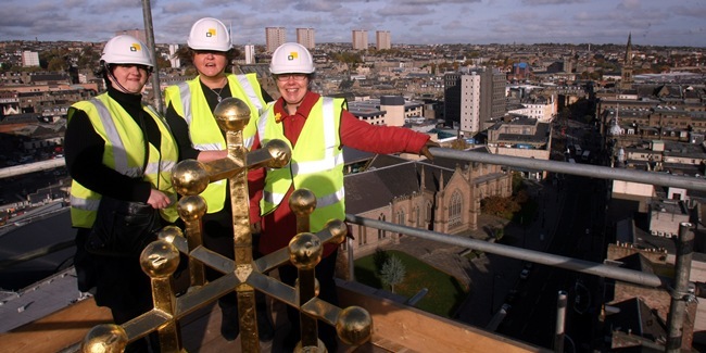 The Dundee skyline got a new addition when a cross was fitted to the top of Meadowside St Paul's church spire in the Nethergate. Minister the Rev Maudeen MacDougall (centre), congregational treasurer Morag Stalker (left) and session clerk Margaret Adamson joined workmen at the top of the 150ft-spire to see the structure being put up.