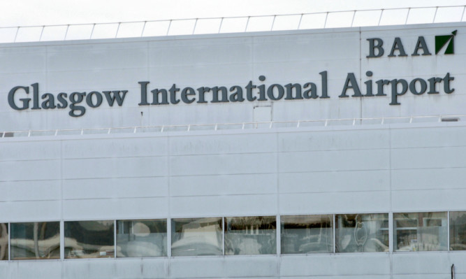 The trio are accused of being drunk on board the plane as it was due to leave Glasgow Aiirport.