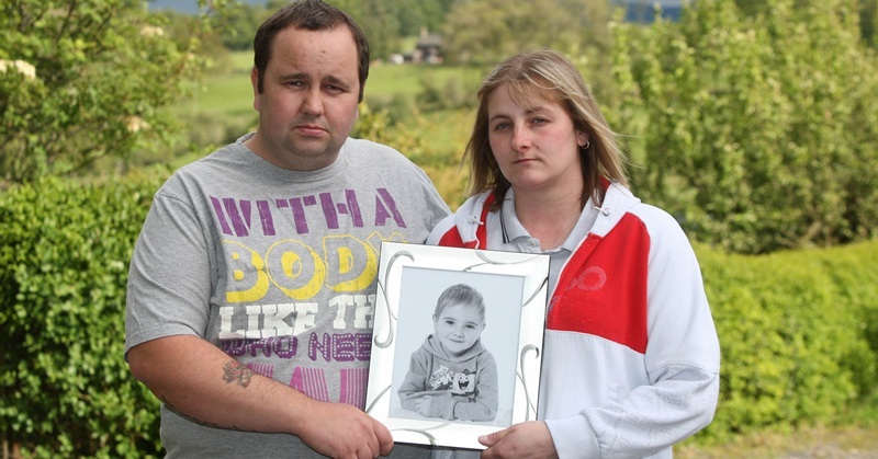Steve MacDougall, Courier, 6 Park Cottages, Drummond Castle, by Muthill. Family unhappy with Ambulance service after death of youngest son. Pictured, left is father Martin Gray,  and right is mother Lisa Gray holding a picture of deceased son Martyn Gray (correct spelling). PICTURE TO BE HELD FOR SATURDAY PAPER.