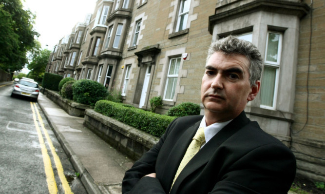 Mark Iannarelli outside the flats in Seafield Road.