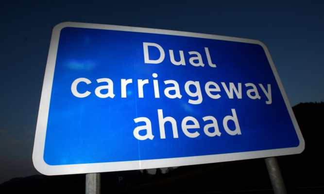 Kris Miller, Courier, 31/01/12. Picture today shows Dual carriageway ahead sign near Pitlochry for story about dualling of A9.