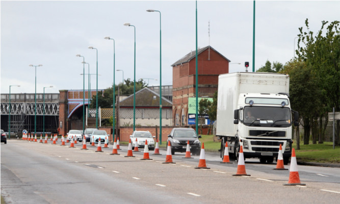 Work has started on reducing the road to single carraigeway in both directions on Riverside Drive.