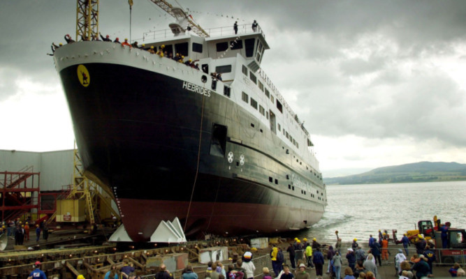 Happier days: the launch of the MV Hebrides at Ferguson shipbuilders in Port Glasgow. The firm has now collapsed into administration.