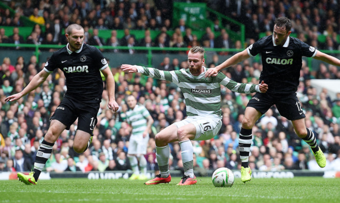 Callum Morris (left) was part of a United defence that failed to cope with 
Celtic's attacking threat.