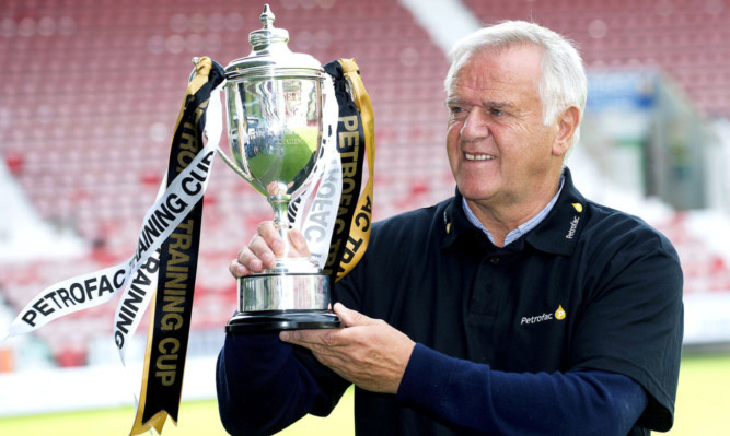 Jim Jefferies with the Petrofac Training Cup at East End Park.