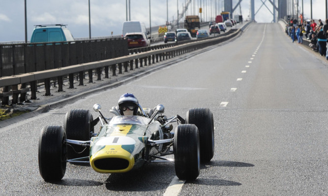 Jim Clark's F1 Lotus crossing the bridge.