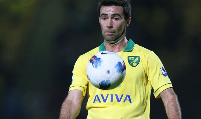 Simon Lappin in action for Norwich.