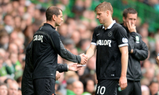 Stuart Armstrong comes off injured at Celtic Park.