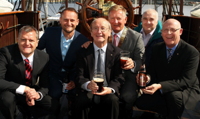 At the Oktoberfest launch at the RRS Discovery, from left: Paul Barnett, director of Barnetts Volkswagen; Craig Simpson, commercial director of Radio Tay; Jonathan Stewart of Speedwell Inns; Dundee Rotary president Robert Dunn; Mark Munsie, operations director of Dundee Heritage Trust; and Jim Pickett, director of Patch.