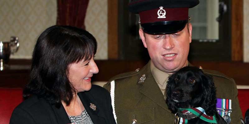 (left - right) Jane Duffy (mother of Lance Corporal Liam Tasker) and Sergeant Matthew Jones, with search Dog Grace accepting the PDSA Dickin medal at Wellington Barracks, London, on behalf of Theo the Army search dog, who died just hours after his handler Lance Corporal Liam Tasker serving in Afghanistan.