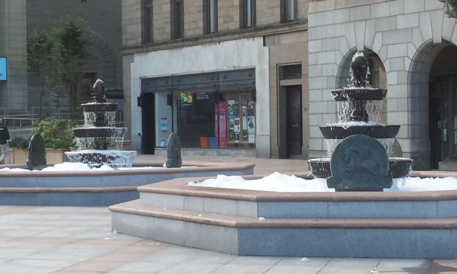 The City Square fountains filled with foam this morning.