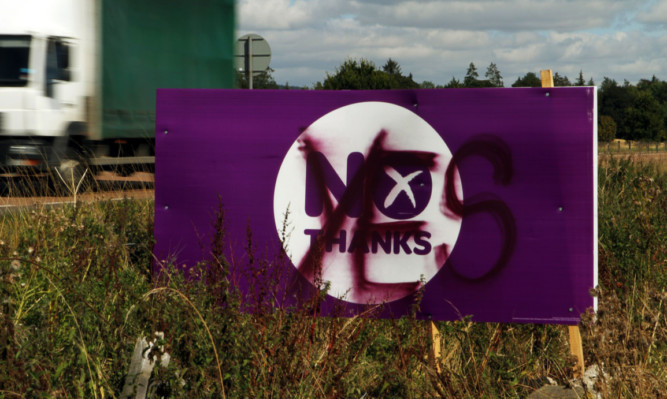 One of the vandalised 'No' signs at the side of the A90 in Perthshire.