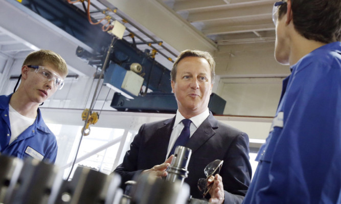 David Cameron visiting engineering business MacTaggart Scott in Edinburgh on Friday.