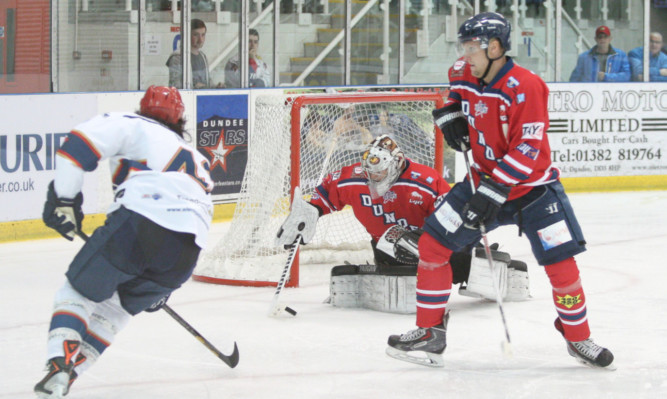 Stars goaltender Mark Cheverie snuffs out a Capitals attack in Saturdays meeting in Dundee.