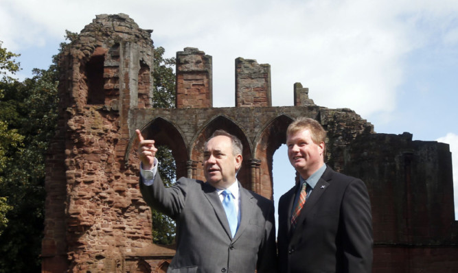 First Minister Alex Salmond with Historic Scotland's Douglas Wilson during his visit to Arbroath Abbey.