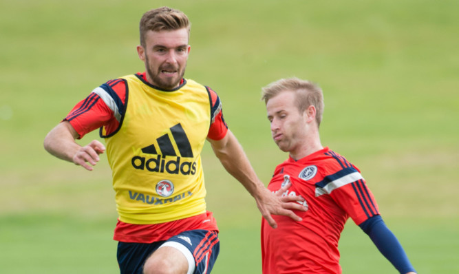 Barry Bannan (right) up against James Morrison in training.