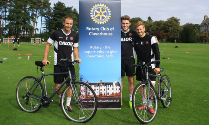 Dundee Uniteds Sean Dillon, John Souttar and Stuart Armstrong supporting the Cyclathon.