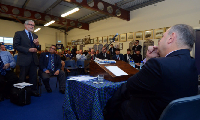 Bertie Armstrong stands up to make his point to Alex Salmond.